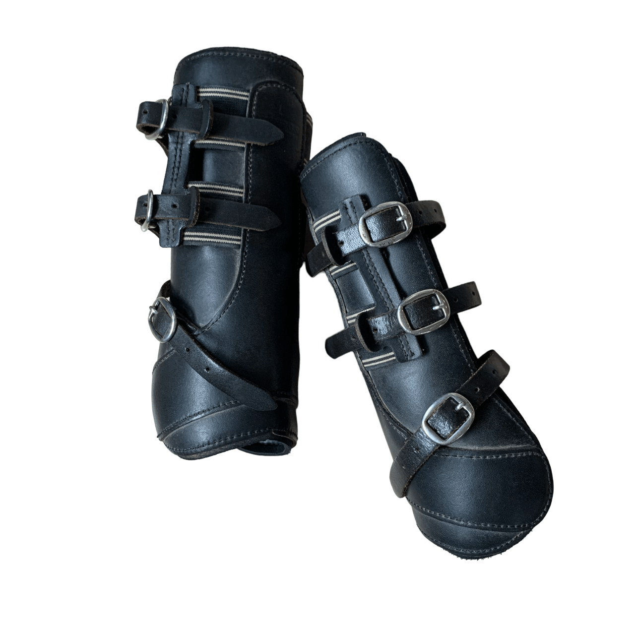 Side views of leather splint boots showing elastic and stainless steel hardware